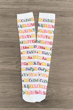 White Alphabet Knee High Socks Accessory Sparkle In Pink Playful Fitted Cotton Socks, Multicolor Stretch Cotton Socks, Non-slip Stretch Cotton Socks, Fun Multicolor Stretch Socks, Cute Stretch White Socks, Cute White Stretch Socks, Fitted Non-slip White Socks, White Fun Non-slip Socks, Fun White Non-slip Socks