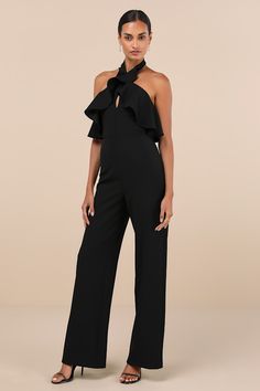 A memorable entrance isn't complete without the Lulus Elegant Flair Black Ruffled Wide-Leg Halter Jumpsuit! This event-ready jumpsuit has a crepe knit fabrication that shapes a crisscrossing halter neckline that creates a keyhole cutout and a princess-seamed bodice framed by a ruffled overlay. High, fitted waist tops wide pant legs that end at full length hems. Dual loop-button closures secure atop a flirty open back design. Hidden no-slip strips and a hidden zipper/clasp at the back. Fit: This Halter Jumpsuit, Adhesive Bra, Wide Pants, Halter Neckline, Black Ruffle, Back Design, Strapless Bra, Wide Leg Jumpsuit, Hidden Zipper