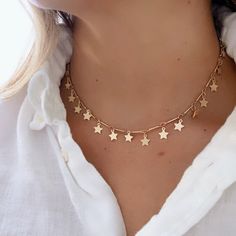 "Multi Star Choker Necklace, Tiny Star Choker Gold *Description & Details ♡ -Necklace length: 14\" + 4\" extension chain -Closure: Lobster Claw -Material: 18k Gold Plated Brass -100% US sourced. -Product type: Necklace" Gold Modern Necklace, Star Choker Necklace, Celestial Star Necklace For Party, Celestial Star-shaped Necklace For Party, Party Star Charm Necklaces, Party Necklace With Star Charm Dangle, Party Dangle Necklaces With Star Charm, Adjustable Star Charm Necklaces, Adjustable Star Charm Necklace