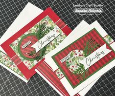 three christmas cards on top of each other