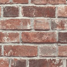 an old brick wall is shown with no mortars or mortars on it's sides