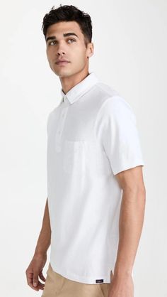 Fabric: Lightweight jersey Collared neck Short sleeves Partial button placket Patch breast pocket Shell: 100% cotton Wash cold Imported, India Measurements Measurements from size L Length: 28.25in / 72cm Chest: 44in / 112cm White Tops With Pockets And Collared Neckline, Classic White Tops With Welt Pockets, White Cotton Tops With Pockets, White Short Sleeve Polo Shirt For Everyday, White Johnny Collar Tops With Pockets, Casual Tops With Welt Pockets And Collared Neckline, Casual Tops With Welt Pockets And Straight Hem, Casual Collared Tops With Welt Pockets, Cotton Tops With Welt Pockets And Collared Neckline