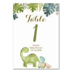 the dinosaur table numbers are shown in green and gold, with leaves around it to match the