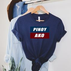 Pinoy Ako Filipino T-shirt, Pinoy T-shirt, Noypi, Pilipino, Pinay, Filipino, Philippines, Tagalog T-shirt This essential fits like a well-loved favorite. Super soft cotton and excellent quality print makes one to fall in love with it over and over again. .: Retail fit .: 100% Soft cotton (fibre content may vary for different colors) .: Light fabric (4.2 oz/yd² (142 g/m .: Tear away label .: Runs true to size Due to differences in screen settings, colors may differ slightly between photos and the Blue T-shirt With Name Print For Fan Merchandise, Fan Apparel Short Sleeve T-shirt With Funny Text, Fan Apparel T-shirt With Funny Text, Funny Text Fan Apparel Short Sleeve T-shirt, Funny Text Short Sleeve Fan Apparel T-shirt, Fan Apparel Tops With Funny Text, Short Sleeve, Fan Merchandise T-shirt With Name Print, Fan Apparel Short Sleeve T-shirt With Name Print, Fan Apparel T-shirt With Name Print