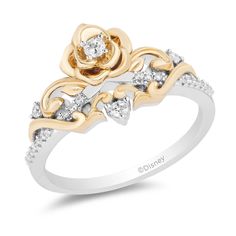 a yellow and white gold ring with diamonds