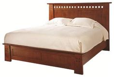 a wooden bed frame with white sheets and pillows on it, against a white background