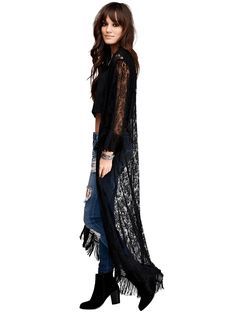 Introducing the Long Black Tassel Lace Kimono, a stunning piece that exudes elegance and femininity. Perfect for any occasion, whether it’s dressing up for a night out or adding a touch of glamour to your everyday look. The intricate lace detailing and flowy tassels create a mesmerizing effect that will have you twirling with joy. This versatile piece can be worn as a cover-up over swimwear or paired with jeans and a camisole for a boho-chic vibe. Made with quality materials, this kimono is lightweight and comfortable, making it ideal for year-round wear. With its timeless black color and elegant design, the Long Black Tassel Lace Kimono is bound to become a staple in your wardrobe. Add it to your collection today and experience the power of true style. Specifications Thickness: Thin (Summ Witch Attire, Bohemian Style Kimono, Lily Aesthetic, Tassel Outfit, Lace Tassel, Gilet Kimono, Black Lace Cardigan, Fringe Clothing, Open Dress