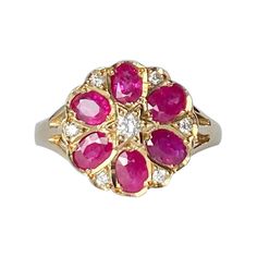 This stunner holds 6 rubies and 7 diamonds. The rubies are a bright, rich pink tone and the diamonds are so bright and sparkly. The diamonds total 20pts and the rubies total 1.2carats. The ring is modelled in 9carat gold. Ring Size: M 1/2 or 6 1/2 Cluster Diameter: 13mm Height From Ring: 5.5mm Weight: 3.2g Ruby And Pearl, Pearl Cluster Ring, Pearl Cluster, Ruby Diamond, Pink Tone, Cluster Ring, Gold Ring, Floral Rings, Pink Color