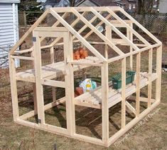 a small wooden house built into the ground