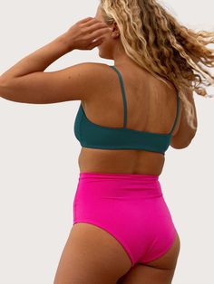 Perfect for any occasion and any rack. Is it a swim top? Is it a surf top? Is it a bra? Is it the best ever? Yes to all of the above. We love pairing this top with the High Tide or Hi Hi Bottoms. Size + Fit Scoop front, medium coverage bikini top. Good for all chest sizes. LOF best selling top for good reason. Please reference Left On Friday Material + Care Smoothing Dream Fabric™ is insanely soft, holds you in, and smooths you out. It is fade + snag resistant and loves chlorine + salt water. Co Left On Friday Swim, Athleisure Swimwear With Built-in Bra For Poolside, Swimwear With Built-in Bra For Workout, Sporty Pink Triangle Top Swimwear, Athleisure Swimwear With Removable Bra Pads For Workout, Beachwear Sports Bra With Built-in Bra For Swimming, Pink Seamless Athleisure Swimwear, Sporty Bra Friendly Swimwear For Beach, Athleisure Swimwear With Bra Friendly Design For Swimming