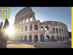 the colossion in rome, italy with sun shining on it's side