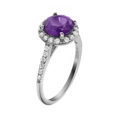 Decorated with purple and white cubic zirconia stones, this halo ring offers understated elegance. Comes in a gift box. Click on this JEWELRY & WATCHES GUIDE to learn about fit, styles, materials and more!RING DETAILS Width: .43 in. Metal: rhodium-plated sterling silver CUBIC ZIRCONIA DETAILS Cut: round Color: purple, white Setting: prong  Size: 9. Gender: female. Age Group: adult. Cubic Zirconia Birthstone Promise Ring With Halo, Formal Birthstone Ring With Halo And Round Cut, Purple Diamond Ring With Halo Setting And Round Cut, Elegant Halo Birthstone Ring With Cubic Zirconia, Purple Round Cut Rings With Halo Setting, Purple Round Cut Halo Setting Rings, Purple Cubic Zirconia Birthstone Ring, Amethyst Cubic Zirconia Ring With Halo Setting, Cubic Zirconia Birthstone Ring With Halo Setting