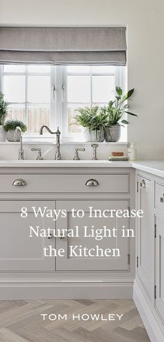 the kitchen is clean and ready to be used as a natural light in the kitchen