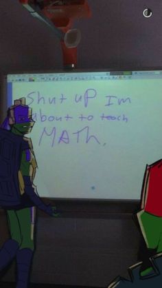 a man standing in front of a whiteboard with writing on it and another person holding a knife