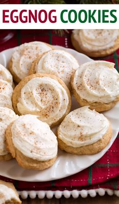 cookies with white frosting are on a plate