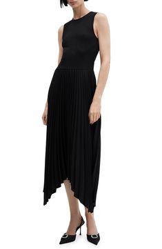 In this easy-to-love dress, a smooth, sleeveless bodice gives way to a skirt swirled in perky pleats. Slips on over head Jewel neck Sleeveless Unlined 96% polyester, 4% elastane Machine wash, line dry Imported Black Sleeveless Dress With Pleated Hem, Black Pleated Sleeveless Midi Dress, A-line Pleated Dress With Pleated Hem For Daywear, Pleated Sleeveless A-line Dress Fit And Flare, Black Pleated A-line Sleeveless Dress, Sleeveless Midi Dress, Handkerchief Hem, Easy To Love, A Skirt