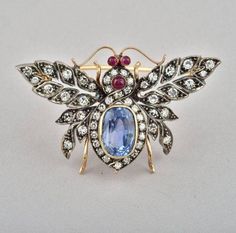 Handmade item  Recycling: No Brooch weight: 14.590 Grams Brooch Length: 1.50 Inches  Brooch Width: 1.50 Inches  Gemstones: Natural Rose cut diamonds, Ruby & Blue Sapphire  Diamonds weight: 2.87 Carats Diamonds Shape: Round  Diamonds Colure: Light Tinted Brown  Sapphire & Ruby weight: 3.95 Carats  Sapphire & Ruby: Lab Created  Material: Silver  Silver purity: 925 Brooch Finished: Antique & Gold Ballet Jewelry, Animal Themed Jewelry, Bee Jewelry, Bee Brooch, Ceylon Sapphire, Insect Jewelry, Diamond Brooch, Silver Christmas, Themed Jewelry