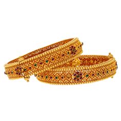 This set of 22k Indian gold bangles have a beautiful assortment of colorful gemstones that create a vibrant contrast against the filigree frame of these gold bangles. Features • 22k yellow gold • Emerald • Ruby • Filigree details • Set of two (2) bangles Our quality Indian bangle collection contains a wide array of 22k gold bangles that each have one of a kind details and unique accents that can transform any look. Whether you're shopping for gold bangles to wear daily or for an upcoming event, Gold Gemstone Bangle For Festivals, Gold Bangle With Gemstone For Festivals, Gold Fusion Bangle For Diwali, Gold Fusion Bangle With Gemstone, Gold Fusion Style Bangle For Diwali, Gold Jeweled Fusion Bangle, Traditional Yellow Gold Bracelets With Gemstones, Gold Fusion Style Jeweled Bangle, Gemstone Bangle For Festivals