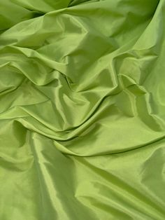 a close up view of a lime green colored fabric that is very soft and smooth