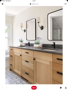 a bathroom with double sinks and mirrors on the wall above them is featured in an instagram