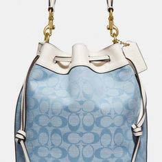 Signature Chambray And Glovetanned Leather Inside Zip Pocket Drawstring Closure, Fabric Lining Detachable Handle With 5 3/4" Drop Detachable Strap With 24 1/2" Drop For Shoulder Or Crossbody Wear Four Protective Feet At Base 8 3/4" (L) X 9 3/4" (H) X 5 1/2" (W) Style No. C4693 Elegant Coated Canvas Bucket Bag For Errands, Coach Bucket Bag For Travel, Coach Travel Bucket Bag With Gold-tone Hardware, Coach Luxury Bucket Bag For Errands, Coach Bucket Bag For Errands, Coach Travel Bucket Bag With Removable Pouch, Luxury Coach Bucket Bag For Errands, Coach Bucket Bag With Leather Handles, Coach Bucket Bag With Top Handle And Detachable Strap