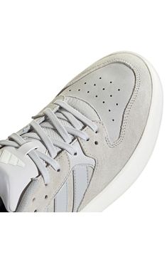 The perfect blend of sport-inspired style and streetwear sophistication comes together in the Court 24 sneaker with a sleek low-top silhouette. Synthetic and leather upper/textile lining/rubber sole Imported Gray Leather Sneakers With Boost Midsole, Gray Leather Skate Shoes With Gum Sole, Adidas Gray Sneakers With Gum Sole, Gray Low-top Synthetic Skate Shoes, Gray Low-top Leather Skate Shoes, Gray Leather High-top Sneakers For Light Sports, Gray Sporty Skate Shoes With Gum Sole, Sporty Gray Sneakers For Skateboarding, Adidas Leather Sneakers For Light Sports