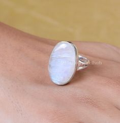 Rainbow Moonstone Ring, 925 Sterling Silver Ring, Oval Shaped Ring, Gemstone Ring, Handmade Ring, Ring for Women, Crystal Ring, Boho Ring Gemstone Name - Rainbow Moonstone  Stone Quality - AAA Ring Weight - 6.84 gm Length - 2.5 cm Width - 1.5 cm Stone Shape - As shown in the picture You'll get the exact product as shown in the pictures We serve complete 925 sterling silver Jewelry and genuine properties of the stone. The products are dispatched from the small business from USA. Product Quality a Large Oval Moonstone Ring, White Oval Moonstone Ring With Large Stone, Large Oval White Moonstone Ring, Oval Moonstone Ring With Large Stone, Oval Moonstone Ring With Natural Stones, Oval Crystal Ring With Natural Stones For Anniversary, White Oval Crystal Ring With Natural Stones, White Oval Crystal Gemstone Ring, Oval White Crystal Gemstone Ring