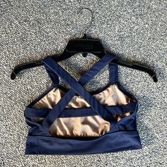 Never Worn Balera Medium Navy Blue Sports Bra, Crop Top, Dance Top Unique Crossing Straps In The Back Great For Dance Class Or Dance Performances Fitted Blue Activewear With Built-in Padding, Blue Sports Bra With Built-in Bra For Training, Blue Sports Bra With Built-in Bra For Workout, Blue Sports Bra With Built-in Bra For Gym, Fitted Sleeveless Blue Sports Bra, Blue Bra Friendly Crop Top For Yoga, Navy Fitted Yoga Activewear, Blue Stretch Sports Bra With Built-in Padding, Blue Sleeveless Activewear With Mesh Back