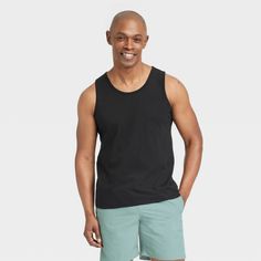 Bring cool comfort to warm-weather days with this Standard-Fit Tank Top from Goodfellow & Co™. Crafted from a lightweight jersey fabric, this standard-fit tank top offers you all-day cool comfort. Falling at the hip for wearing tucked in or untucked, you can coordinate this solid round-neck tee with different bottoms, or layer it under a button-down or hoodie for versatile styling. Goodfellow & Co™: Where style & fit are always in good company. Black Relaxed Fit Activewear For Summer, Relaxed Fit Black Activewear For Summer, Summer Black Activewear In Relaxed Fit, Summer Cotton Activewear, Casual Tops For Warm Weather, Casual Sleeveless Tops For Vacation, Summer Workout Cotton Tank Top, Black Casual Summer Activewear, Casual Black Activewear For Summer