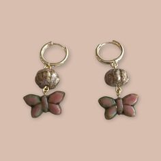 Beautiful Czech glass butterfly earrings, pink with a green wash. Huggie hoops plated in 18k gold Glass Butterfly, Earrings Pink, Butterfly Earrings, Czech Glass, Dangle Drop Earrings, 18k Gold, Plating, Drop Earrings, Glass