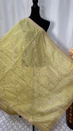 Add a touch of elegance and glamour to any outfit with our stunning Shimmery Zari work Dupatta for Women. Made from high-quality fabric and intricately embroidered with shiny Zari work, these dupattas are perfect for all occasions. The shimmering effect of the Zari work gives the dupattas a luxurious and sophisticated look, making them a must-have accessory for every woman's wardrobe. Available in a variety of colors, these dupattas will add a pop of brightness to any outfit. Whether you're atte Elegant Gold Embroidered Raw Silk Fabric, Formal Art Silk Fabric With Zari Embroidery, Elegant Gold Fabric With Dabka Work, Elegant Gold Fabric With Dabka Embroidery, Formal Bollywood Style Embroidered Fabric, Elegant Intricate Embroidered Fabric For Festive Season, Elegant Embroidered Fabric For Festive Occasions, Elegant Gold Fabric With Zari Work, Semi-stitched Elegant Resham Embroidered Fabric