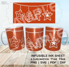 three red coffee mugs with christmas decorations hanging from the side and an inflatable ink sheet