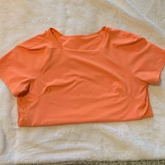 Perfect For Going On Runs In The Dark Reflexive Dots On Both Sides Great Condition Never Worn Orange Athleisure Tops For Sports, Orange Stretch Activewear For Light Exercise, Orange Stretch Sports Tops, Stretch Orange Tops For Sports, Orange Stretch Tops For Sports, Orange Fitted Activewear For Light Exercise, Fitted Orange Activewear For Light Exercise, Orange Athleisure Activewear For Light Exercise, Orange Sporty Activewear For Light Exercise