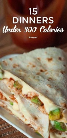 a close up of a tortilla on a plate with the words 15 dinners under 300 calories