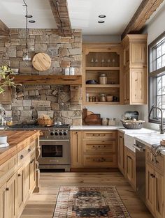 a kitchen with wooden cabinets and an area rug in front of the stove top oven