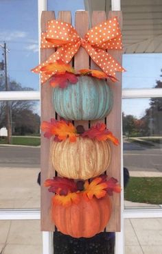 pumpkins are stacked on top of each other