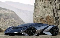 a futuristic car parked in front of a mountain