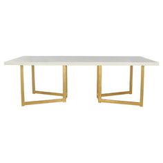 a white table with gold legs on a white background