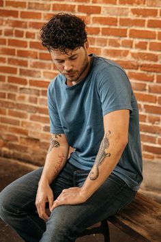 The new 7oz indigo dyed tee is the perfect balance between lightweight and durability. This shirt has been piece dyed and washed, to have the broken-in feel but is less aged than the garment dyed heavyweight version. Now available in Light Indigo and Dark Indigo. The cut of “The Stamp” Tee is influenced by vintage tees with a shorter length and roomier fit, but we didn’t want a tee that was too boxy. After careful development, we found the sweet spot between the vintage boxy cut found in old tee Unstructured Washed Blue Tops For Everyday, Blue Unstructured Washed Tops, Casual Washed Black Pre-washed T-shirt, Washed Black Casual T-shirt, Relaxed Fit Washed Blue Tops, Faded Washed T-shirt, Indigo Washed Short Sleeve Tops, Relaxed Fit Washed Blue Pre-washed Top, Blue Washed Tops For Casual Gatherings