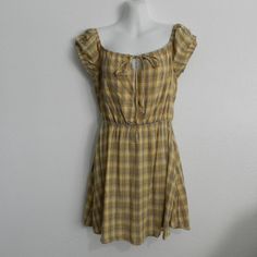 Nwot Yellow, Grey, Black Plaid, Square Neckline, On Or Off Shoulder, Self-Tie Keyhole Front, Elastic Waist And Cap Sleeve Cotton Sundress. Never Worn Pit To Pit 17" Waist L To R 13" Pit To Hem 24" Tags: Spring, Summer, Brunch, Casual, Day Date Yellow Sundress Mini Dress For Daywear, Casual Yellow Mini Length Dresses, Casual Lined Mini Dress For Daytime, Casual Yellow Dress For Daytime, Yellow Fitted Sundress For Daywear, Fitted Yellow Sundress For Daywear, Casual Mustard Sundress For Summer, Casual Lined Plaid Dress, Casual Plaid Lined Dress