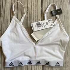 Adidas Training Aeroready Light Support Bra Size Xs White / Black Logo Brand New With Tags Size Xs Stretchy Material Adjustable Straps Fast Shipping! Fitted White Workout Bra, White Sporty Bra For Summer, White Fitted Bra For Gym, Fitted White Bra For Gym, White Bra For Spring Loungewear, Casual White Fitted Bra, White Workout Bra For Summer, White Fitted Workout Bra, Cotton Workout Bra