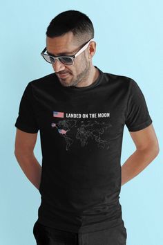 Grab our Patriot shirt as a gift to all of your friends and loved ones. This tee features the statement “Landed on the Moon” on the front chest. This t-shirt reminds us the Apollo 11 lunar landing. The unisex heavy cotton tee is the basic staple of any wardrobe. No side seams mean there are no itchy interruptions under the arms. The shoulders have tape for improved durability. Lunar Landing, American Flag Shirt, Moon Print, On The Moon