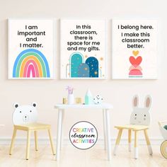 three children's posters on the wall above a table and chairs in a child's room