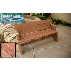 a wooden bench sitting on top of a stone patio