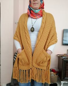 Handmade Yellow Soft Women's Shawl/ Women's Knitwear / Big Scarf / Bohemian Shawl / Wool shawl The thick texture of the shawl I knitted with a skewer will wrap and warm you up on cold days.  When using it as a poncho and shawl, you can carry your pockets and belongings with you.  It was very enjoyable to knit two different models together.  Dimensions  🌼150 cm long, 🌼48 cm wide (measures excluding tassels) .  🌼I knitted it with skewers using 600 g of acrylic wool.  🌼30 Co you can wash Bohemian Knitted Shawl For Winter, Bohemian Knitted Winter Scarves, Bohemian Hand Knitted Shawl, Bohemian Knitted Shawl For Fall, Bohemian Hand-knitted Shawl, Bohemian Shawl Knitting Pattern, Yellow Knitted Bohemian Sweater, Bohemian Hand Knitted Shawl Pattern, Bohemian Hand Knitted Shawl Knitting Pattern