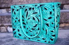 Handmade Turquoise Floral Tote, 100% Leather Bag, Everyday Handbag, Womens Western Purse, Tooled cowgirl, gift for her, handcrafted satchel by VirginiaHandbags on Etsy https://www.etsy.com/listing/627917879/handmade-turquoise-floral-tote-100 Turquoise Hand Tooled Rectangular Shoulder Bag, Western Tote Bags, Tooled Leather Handbags, Western Bedroom, Cowhide Purse, Cowhide Handbags, Tooled Leather Bag, Tooled Leather Purse, Western Purses