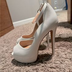 Brand New White 5 Inch Stilettos With One Inch Platform On Front Of Heel. Rhinestone Jewels Set In Gold Setting That Hang Off Strap. One Inch, Gold Set, Shoes Women Heels, Shoes Heels, Color White, Women Shoes, Brand New, Heels, Women Shopping