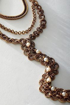 Absolutely adorn your neck with this chunky, layered chain necklace. **Features:** Layered style, multi-chain design, dangling centerpiece, chain fringe, adjustable clasp closure **Why We | Evelyn Necklace by Free People in Gold Multi-strand Metal Necklace With Pearl Chain, Multi-strand Metal Pearl Chain Jewelry, Elegant Double Strand Layered Necklace With Chunky Chain, Chic Multi-strand Metal Chain Necklace, Chic Multi-strand Chain Jewelry, Elegant Metal Layered Necklace With Chunky Chain, Elegant Chunky Chain Link Layered Necklace, Chic Multi-strand Layered Metal Necklace, Elegant Metal Chain Link Layered Necklace