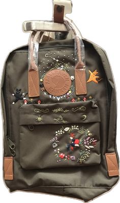 School Backpack With Floral Embroidery, Casual Floral Embroidery Backpack, Casual Floral Embroidered Backpack, Floral Embroidery Travel Backpack, Embroidered Patch Backpack For Everyday Use, Travel Backpack With Floral Embroidery, Embroidered Green Backpack, Custom Embroidered Travel Backpack, Custom Embroidered Backpack For Travel