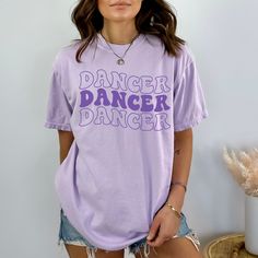 You will love this Comfort Colors retro dancer shirt! It is the perfect trendy dance tee for dancers and dance teachers to wear to dance practice and makes a great gift for dancers! PRODUCTION TIME: 1-3 business days  SHIPPING TIME: 2-5 business days  PRODUCT DESCRIPTION: These ultra soft pigment dyed shirts are one of our best sellers, 100% Cotton. 100% ring spun cotton Preshrunk, soft-washed, garment-dyed fabric Set-in sleeves Double-needle stitched sleeves and bottom hem Twill taped shoulder- Fitted Hip Hop T-shirt For Dance, Fitted Hip Hop Dance T-shirt, Hip Hop Crew Neck Top For Dance, Hip Hop Style Crew Neck Top For Dance, Summer Crew Neck Tops For Dance Class, Crew Neck Tops For Dance Class Summer, Cotton Letter Print Tops For Dance, Cotton Short Sleeve Tops For Dance Class, Cotton Tops With Letter Print For Dance